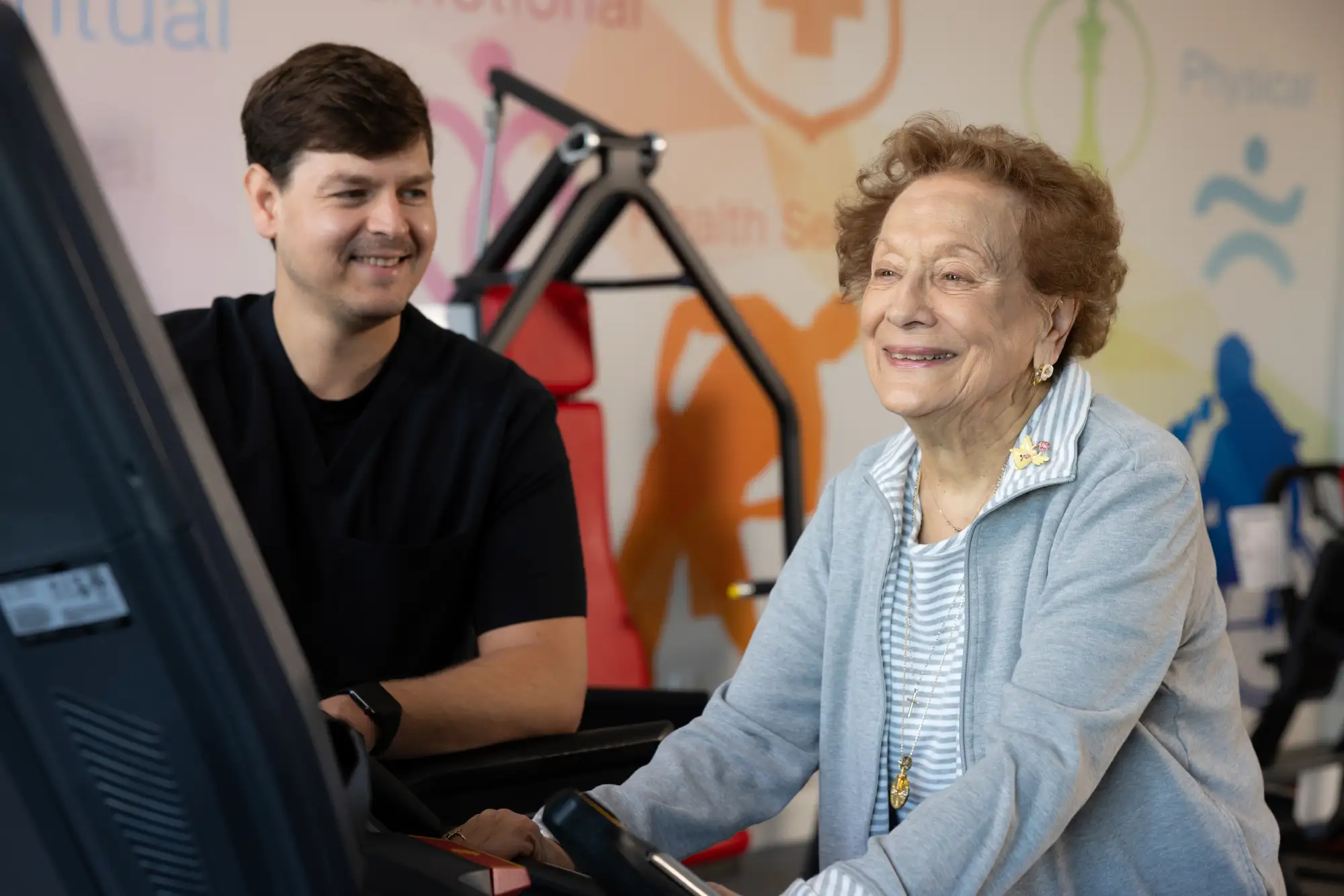 Delaney At The Green residents exercising with a personal trainer