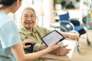 elderly woman getting her blood pressure monitored