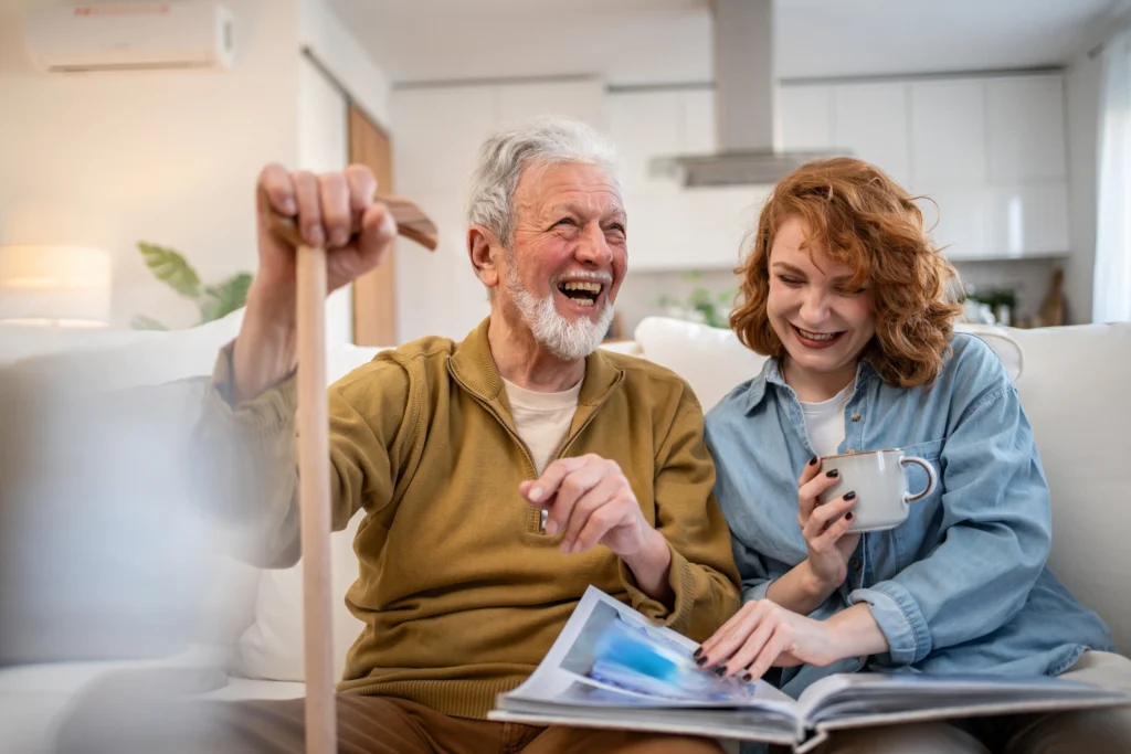 An adult daughter talking with her elderly dad on the best Activities for Seniors with Dementia in Florham Park, NJ.