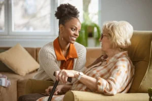 A senior woman exploring the benefits of assisted living from her home at The Delaney at The Green that offers maintenance-free living in Florham Park, NJ.